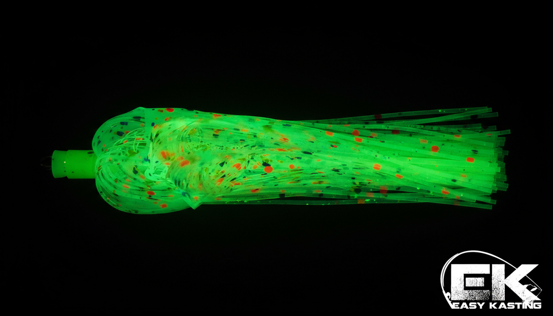EK- Original Wonderbread Glow muskie skirt tabs glowing in dark showing vibrant green luminescence with Blue, Chartreuse and Red dots
